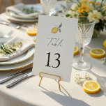 Lemon Wedding Table Number | Amalfi Coast Wedding<br><div class="desc">Add a refined and elegant touch to your reception with this minimalist lemon wedding table number, inspired by the timeless beauty of the Amalfi Coast. Featuring a delicate watercolor lemon illustration paired with modern script and bold typography, this design offers the perfect balance of style and readability. The clean layout...</div>