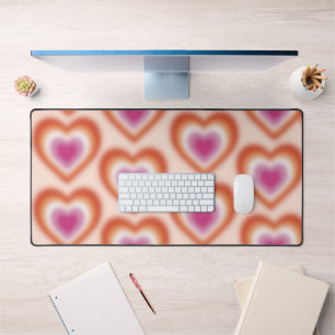 Lesbian flag colors with blurred heart desk mat