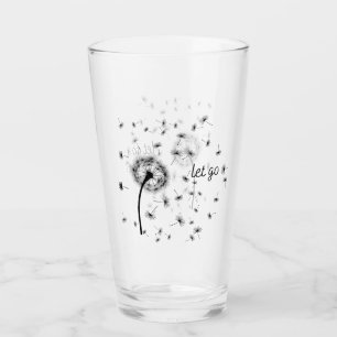 Let go, dandelion seed flowing in the wind  glass