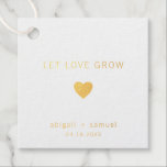 Let Love Grow Modern Gold Foil Wedding Favour Tags<br><div class="desc">Modern and elegant wedding favour tags with a minimal design featuring the message, "Let Love Grow" with a heart, your names and date below. All design elements are in real gold foil over a white background. These simple, contemporary tags are perfect for the minimalist couple and add a personal touch...</div>