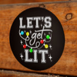 Let's Get Lit Christmas Party Funny - Xmas Light Classic Round Sticker<br><div class="desc">Get into the festive spirit with our 'Let's Get Lit Christmas Party Funny - Xmas Light' design! Perfect for adding some humour to your holiday celebrations, this playful design features vibrant Christmas lights and a witty phrase that will light up any gathering. Whether you're hosting a Christmas party, attending an...</div>