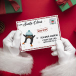 Letter from Santa cute penguin elf stamp Envelope<br><div class="desc">With this envelope, your letter from Santa will have a classy touch, and with its special Elf and Express delivery stamps, it will reach your home in the blink of an eye! The envelope features a cute cartoon penguin with a light blue hat and ice skaters, on a white background...</div>