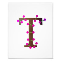Letter T decorative initial on white