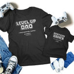 Level Up Gamer Dad Child Next Gen Player Matching Baby T-Shirt<br><div class="desc">Celebrate the ultimate gaming bond with our "Gamer Dad & Next Gen Player" matching t-shirts! Featuring retro designs "Level Up Dad" and "Next Gen Gamer, " these shirts are perfect for Father's Day, birthdays, or any gaming event. Show your shared passion with bold, pixelated graphics. Ideal for gamer dads and...</div>