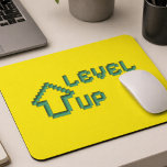Level Up Retro Pixel Art Mousepad<br><div class="desc">Upgrade your workspace with a burst of retro energy! This high-quality mousepad features a vibrant 8-bit "Level Up" pixel art design on a high-visibility neon yellow background. Designed for both style and performance, the smooth cloth surface ensures precise mouse tracking, while the non-slip rubber base keeps it securely in place...</div>