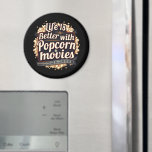 Life Is Better with Popcorn & Movies Retro Design Magnet<br><div class="desc">This bold and nostalgic design celebrates the magic of movie nights with a playful vintage cinema aesthetic. Featuring rich typography surrounded by buttery popcorn, glowing marquee lights, and a classic film reel, this artwork evokes the cosy joy of settling in for a great film. The deep tones and retro-inspired lettering...</div>