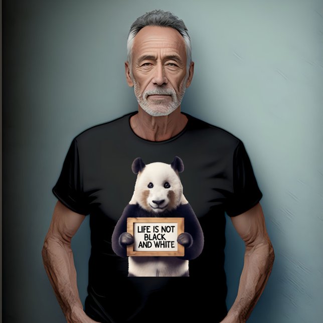 Life is Not Black and White T-Shirt (Older man wearing a black t-shirt with a panda bear holing a sign on the front)