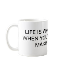 LIFE IS WHAT HAPPENS FLAN MUG