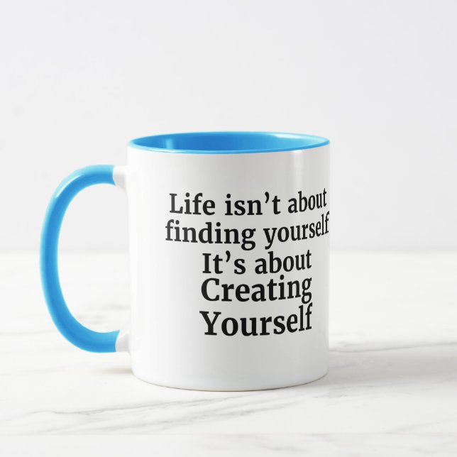 Life isn't about finding yourself motivation quote mug (Left)