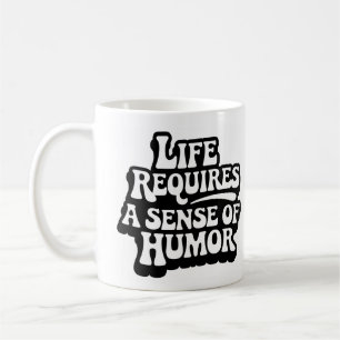 "Life Requires A Sense Of Humour" Coffee Mug