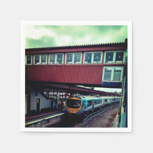 Light blue train , under the bridge napkin