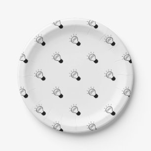 Light bulb in black and white paper plate