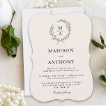 Light Ecru Simple Elegant Monogram Crest Wedding Invitation<br><div class="desc">A tasteful and classic choice in wedding invitations, this monogram crest design conveys a simple elegance in its text layout and bracket shape style. A simple open laurel wreath of sketched leaves surrounds the monogram initial of the bride and groom on a neutral light ecru background. The elegant yet simple...</div>