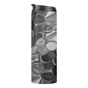 Light gray and dark rounded shapes. thermal tumbler