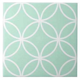 Light green and white repeat circle leaf pattern ceramic tile