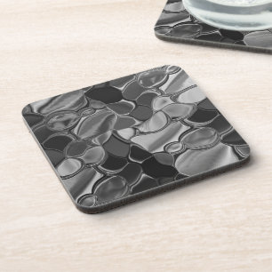 Light grey and dark rounded shapes. coaster