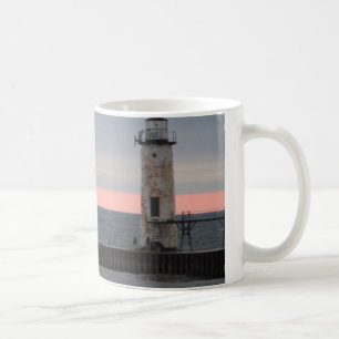 Light house and sunset view coffee mug