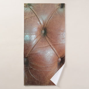 Light on brown leather sofa surface, textureabstra bath towel