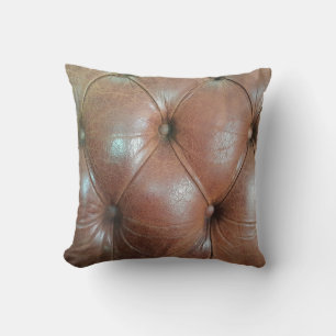 Light on brown leather sofa surface, textureabstra cushion