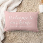 Light Pink Script Welcome to Our Home Lumbar Cushion<br><div class="desc">Soft light pink and white pair beautifully on this personalised indoor lumbar pillow featuring Welcome to Our Home in elegant script with your family name below. The gentle pink hue brings a fresh,  airy warmth to any living room,  guest room,  or entryway seating area. All text is fully customisable.</div>
