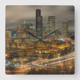 Light streaks from cars at night square wall clock