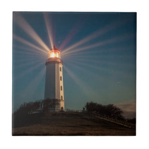 Lighthouse on a Hill Shining at Night Ceramic Tile