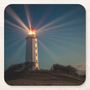Lighthouse on a Hill Shining at Night Square Paper Coaster