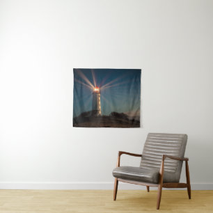 Lighthouse on a Hill Shining at Night Tapestry