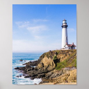 Lighthouse on hill blue sky white house ocean poster