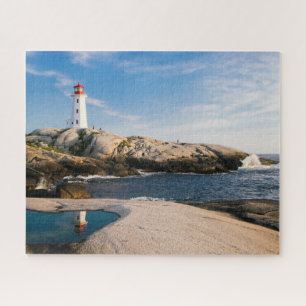 Lighthouse on Rocks with Ocean Reflection Jigsaw Puzzle