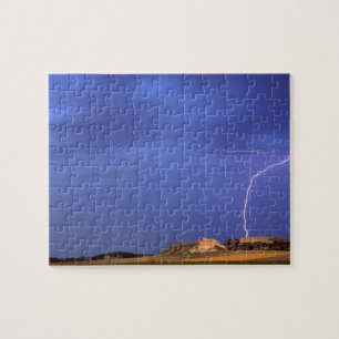 Lightning strikes buttes near Scottsbluff Jigsaw Puzzle