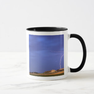 Lightning strikes buttes near Scottsbluff Mug