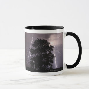 Lightning Strikes In The Sky Behind A Tree Mug