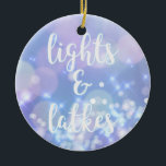 Lights & Latkes - Blue Sparkles Happy Hanukkah Ceramic Ornament<br><div class="desc">NewParkLane - Glamorous Hanukkah Ornament,  with blue sparkling,  glittering lights and fun quote 'lights & latkes' in a script typography. 

This design is also available on cards and postcards.</div>