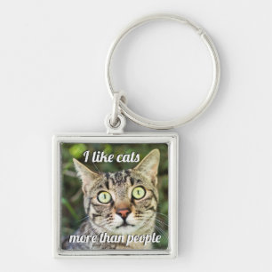 Like cats more than people green-eyed cat close-up key ring