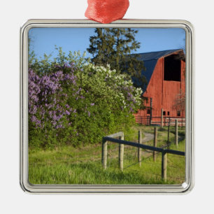 Lilac bushes in bloom and magpies in the trees metal ornament