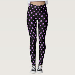 Lilac cross stitches on black leggings