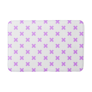 Lilac cross stitches on white bath mat