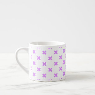 Lilac cross stitches on white espresso cup