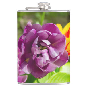 Lilac tulips on a sunny day hip flask