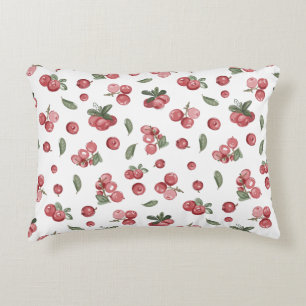 Lingonberries on a white background in a northern decorative cushion