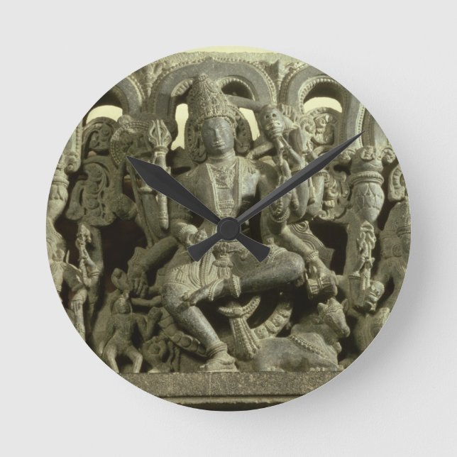 Lintel depicting The Trinity: Siva, Brahma and Vis Round Clock (Front)