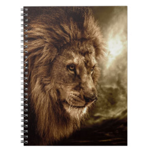 Lion against stormy sky notebook