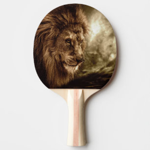 Lion against stormy sky ping pong paddle