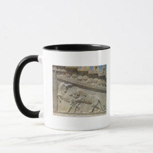 Lion fighting bull, relief east staircase mug