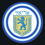 Lion of Judah Emblem Ariel Hebrew Sticker<br><div class="desc">Round sticker with an image of a blue and yellow Lion of Judah emblem with Ariel in Hebrew at the top, and wide double blue borders trimmed in light blue on white. See matching confetti, label and wrapping paper. See the entire Hanukkah Sticker collection under the CARDS & STICKERS category...</div>