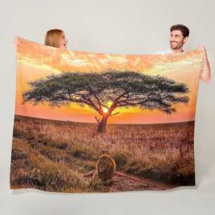 LION ON THE AFRICAN PLAINS FLEECE BLANKET