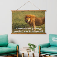 Lions in a field looking at you