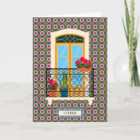 Lisbon house window with tiles and plants