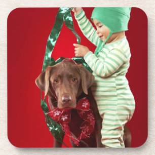 Little boy decorating a dog coaster